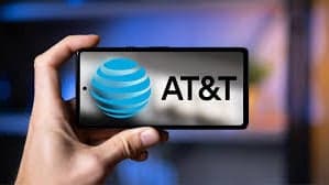 AT&T's $1 billion spectrum purchase was approved after the company seemingly gave in to demands from Trump and Carr.